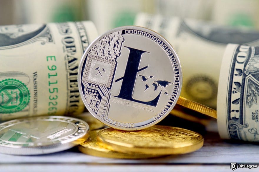 KuCoin review: an LTC coins surrounded by some $100 bills.