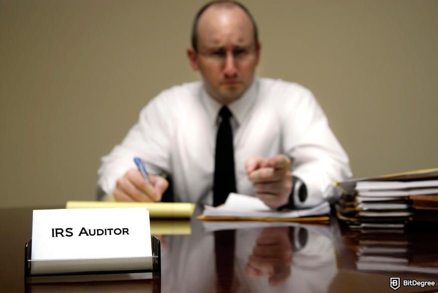 Ledger taxes: an IRS auditor with a stern expression.