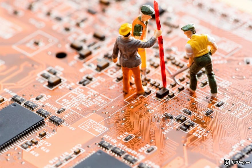 Ledger taxes: miniatures of a team on a construction site while working on an electronic circuit to represent mining.