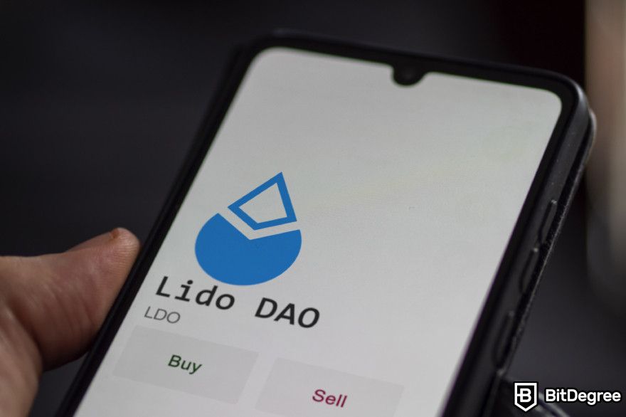 Lido staking: Lido DAO logo on a phone screen.