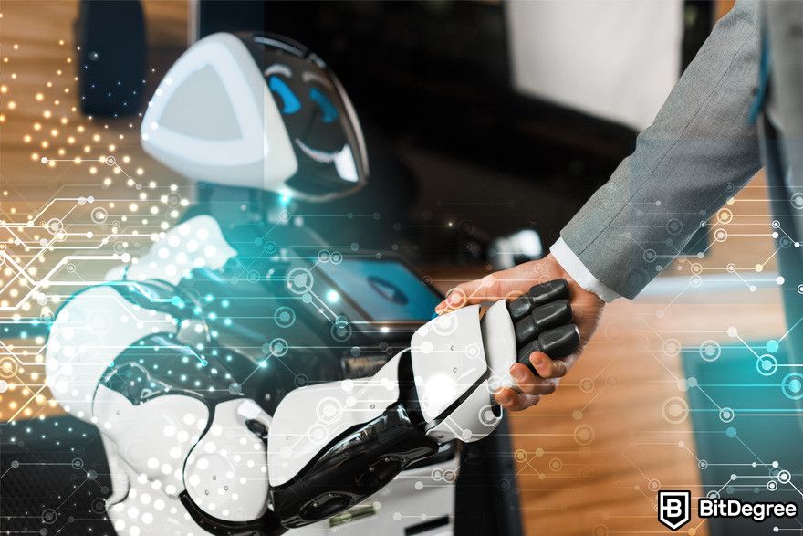 Machine learning vs AI: human and robot handshake.