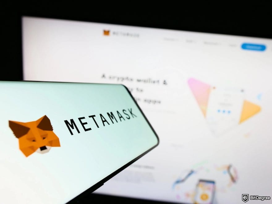 MetaMask review: a phone displaying MetaMask logo.