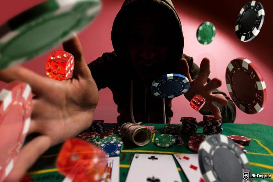 MetaWin review: a hooded person throwing some dice and poker chips at a poker table.