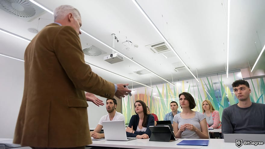 MIT data science certificate: instructor with a group of students.