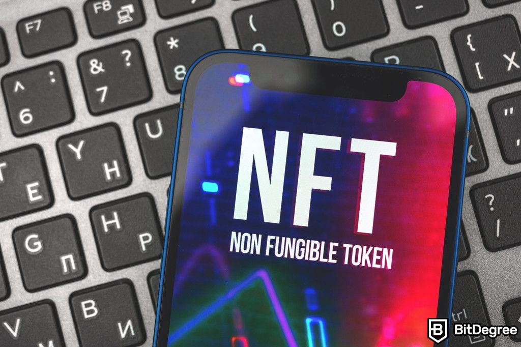 Most popular NFTs: a smartphone with NFT Non Fungible Token as its background.