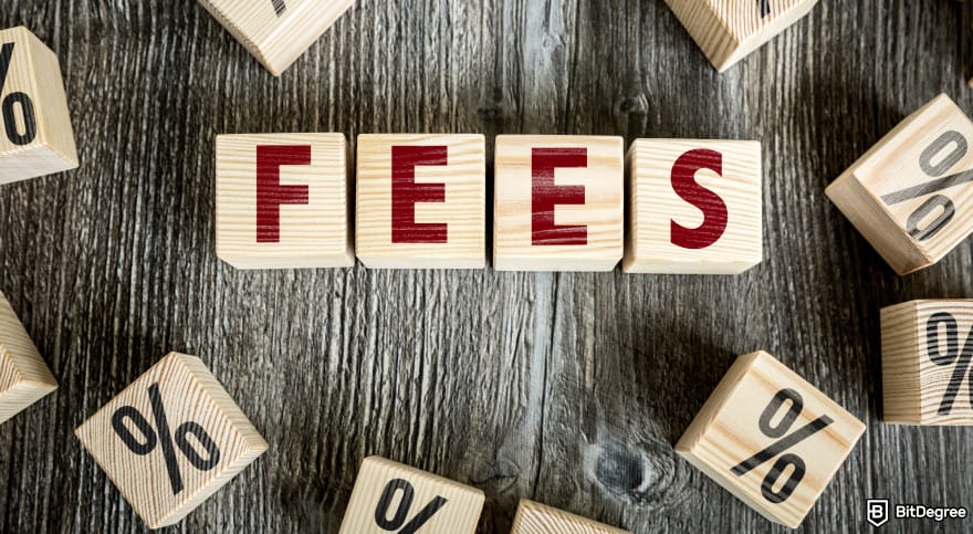 Nexo Card Review: wooden blocks that say FEES.