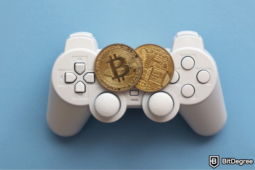 Plant VS Undead NFT: a gaming controller with two Bitcoins on top of it.