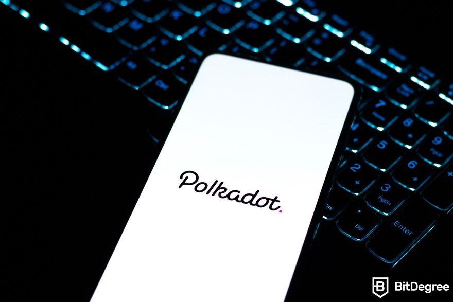 Polkadot staking: a smartphone screen showing Polkadot logo.