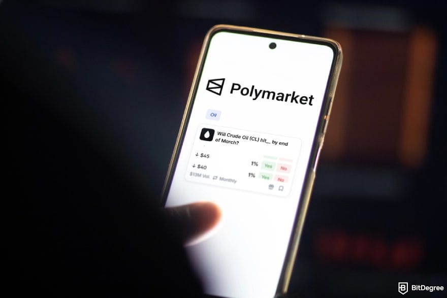 Polymarket review: a hand holding a phone showing a market on Polymarket.