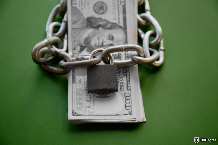 Privacy-focused exchange: a stack of black-and-white hundred-dollar bills and a chain Privacy-focused exchange: a stack of black-and-white hundred-dollar bills and a chain