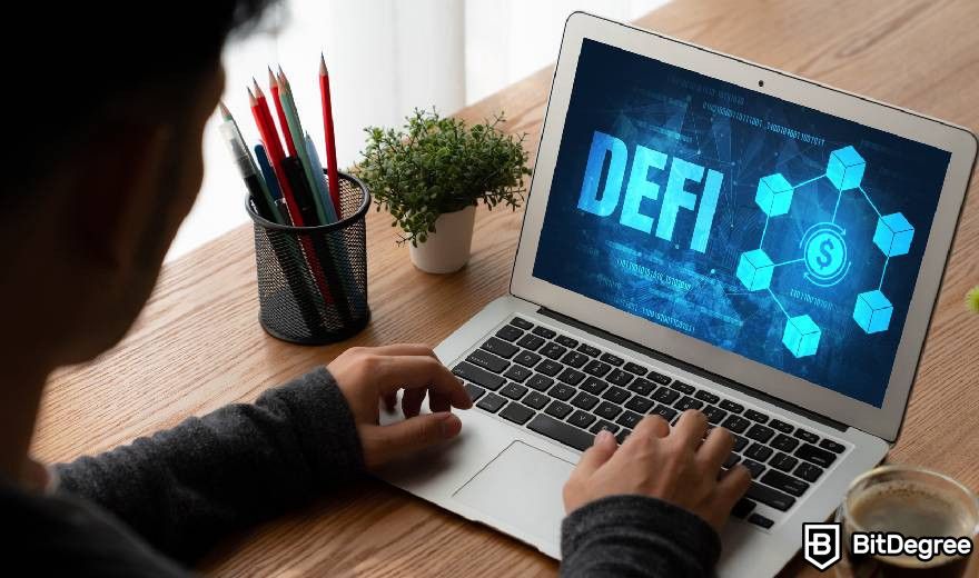 Public VS Private Blockchain: a man in front of a laptop with "DeFi" written on the screen.