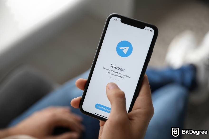 Pump and dump crypto: Telegram app icon displayed on a phone screen