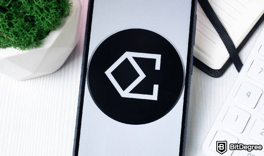 Real World Asset Crypto: a phone on the table showing the Ethena logo.