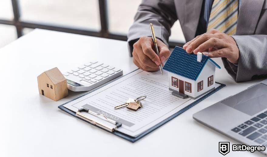 Real World Asset Crypto: a real estate agent working on a document.