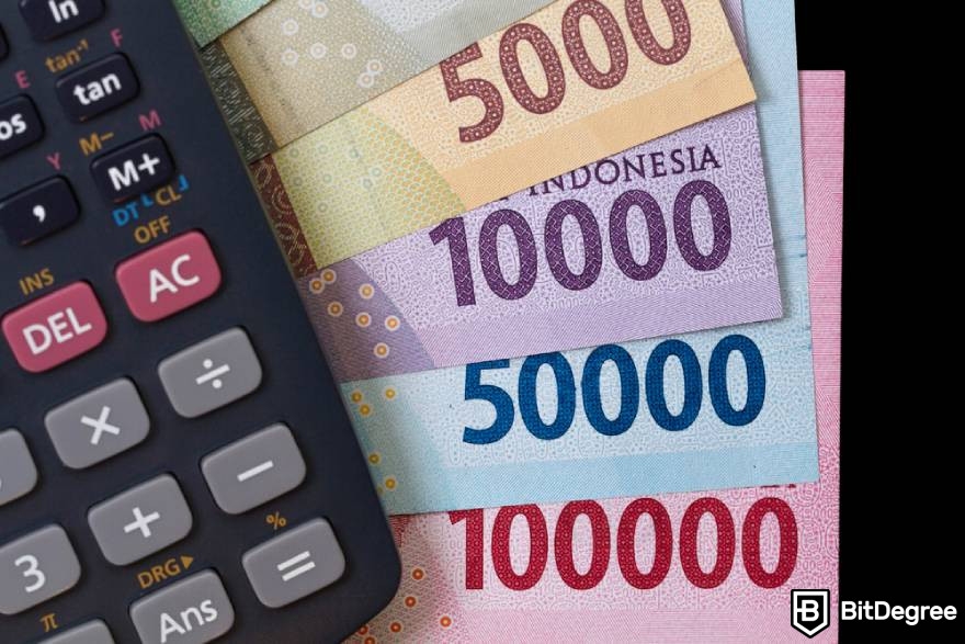 Review Triv: kalkulator dengan uang kertas rupiah Indonesia.