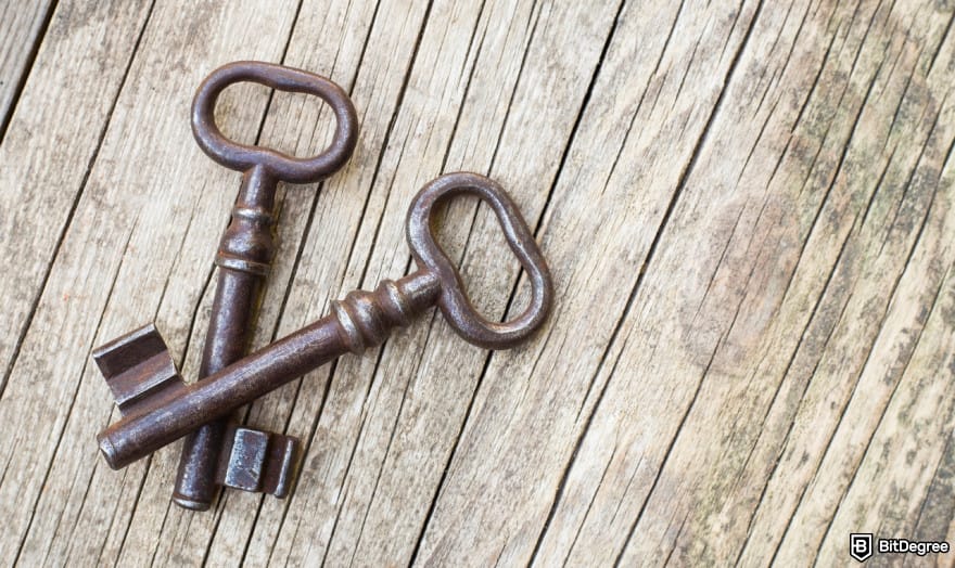 Safest crypto exchange: two iron keys laid on a wooden surface.