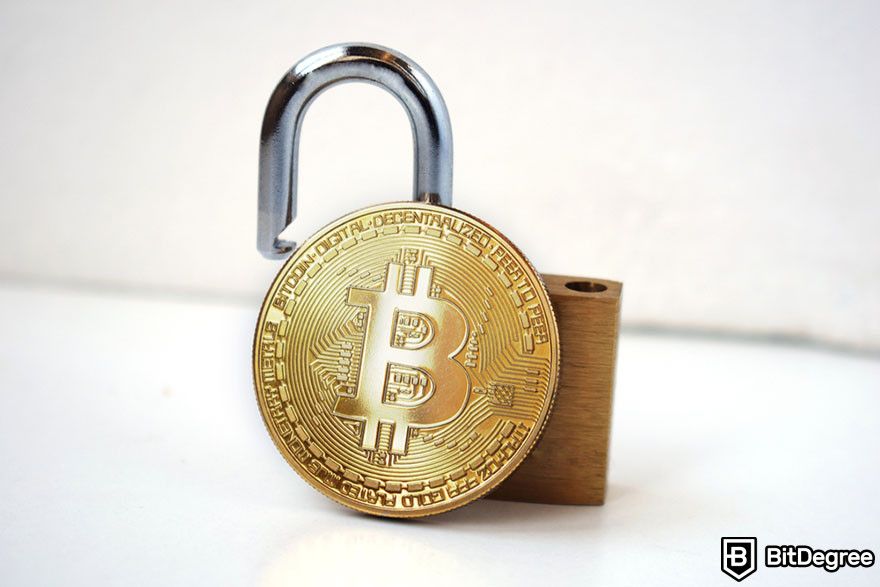 Staking crypto: A Bitcoin token and a padlock.