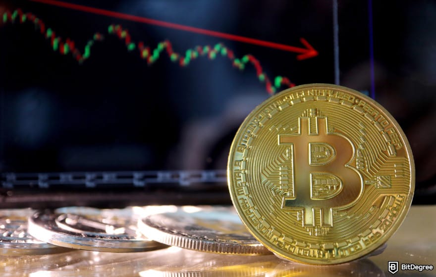 Stop loss in crypto: a Bitcoin in front of a market chart with a downward trajectory.