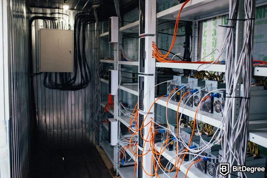 Token gating: cables on shelf connected to electricity.