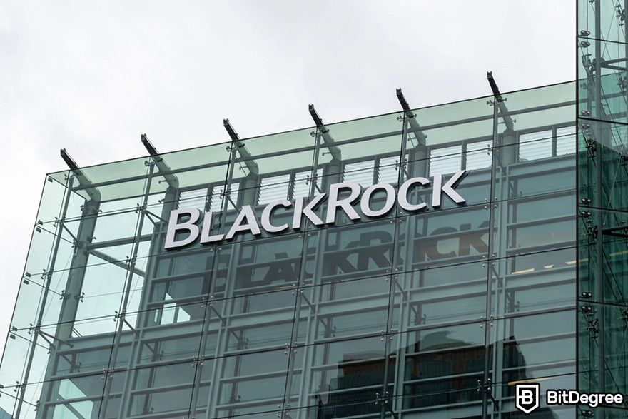 Top security tokens crypto: BlackRock building with the company logo prominently displayed on a glass facade.