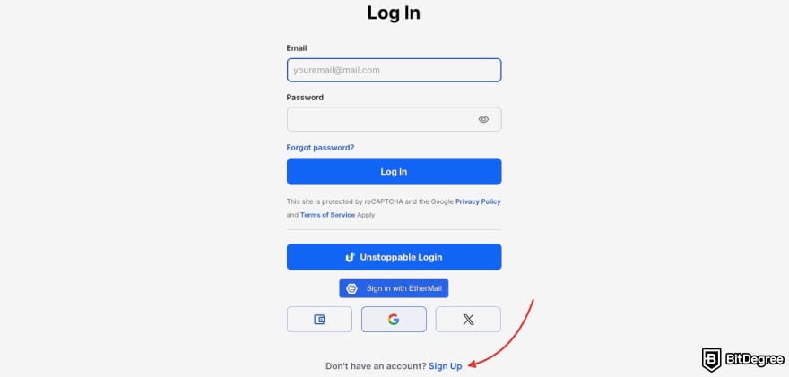Unstoppable Domains promo credits: a red arrow pointing to the [Sign Up] option.