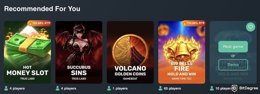 Vave casino review: the [Real game] and [Demo] buttons over a game's thumbnail.
