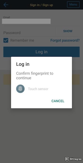 Western Union review: logging in using fingerprint on the Western Union app.