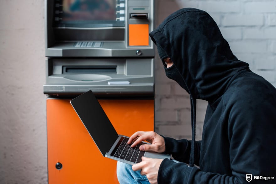 What is a digital wallet: a hacker breaking into an ATM.