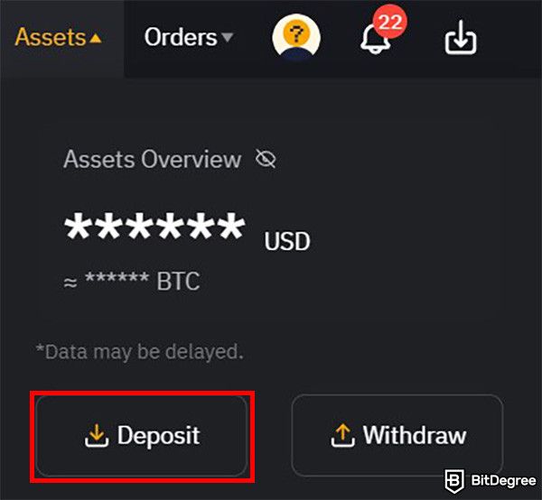 What is Bybit: the Assets menu with the Deposit button highlighted.