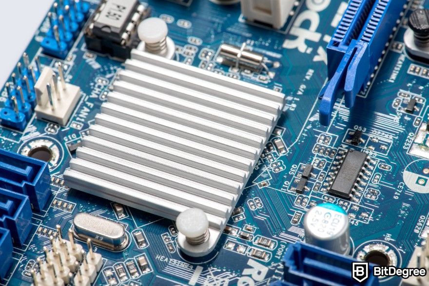 What is crypto mining: a close up of a chipset heatsink on a motherboard.