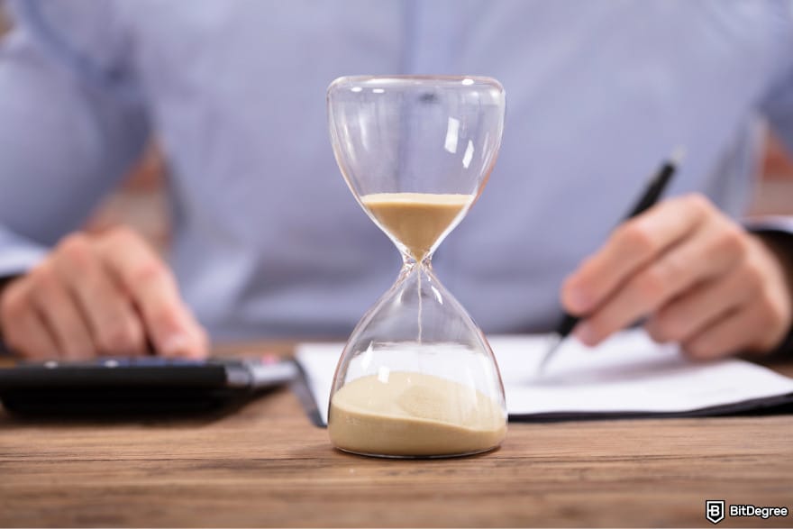 What is double-spending in blockchain: a sand hourglass.