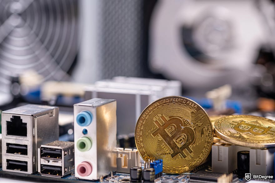 What is double-spending in blockchain: a few Bitcoins next to mining servers.