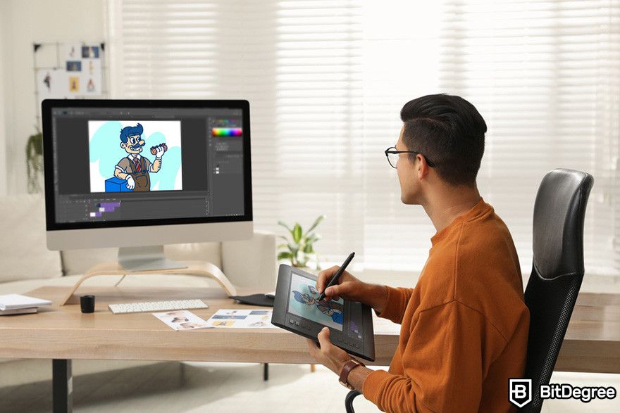 What is Render crypto: a person using a digital drawing tablet and a desktop computer to make an animated picture.