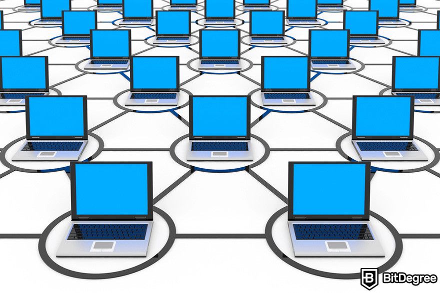 What is Toncoin: laptops connected with lines representing a computer network.