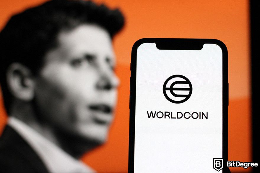 Worldcoin là gì: một chiếc điện thoại hiển thị logo của Worldcoin với hình ảnh Sam Altman ở phía sau.