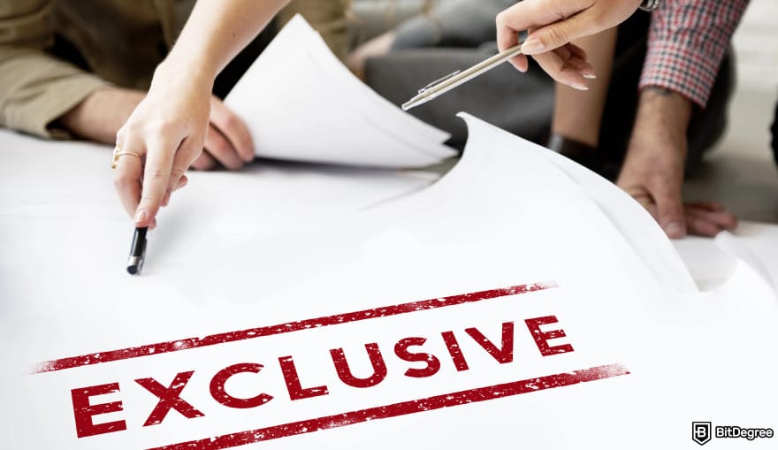 What is xNFT: a paper with the word exclusive written on it.
