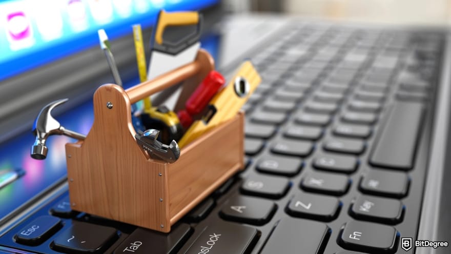 White label crypto exchange: toolbox with tools on laptop.
