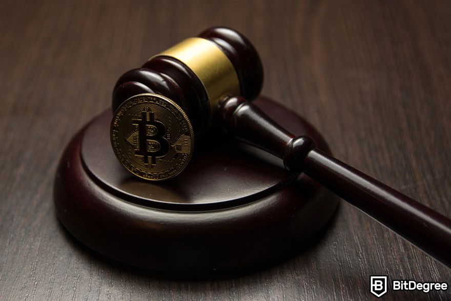 Why does crypto have value: a BTC coin on a gavel.