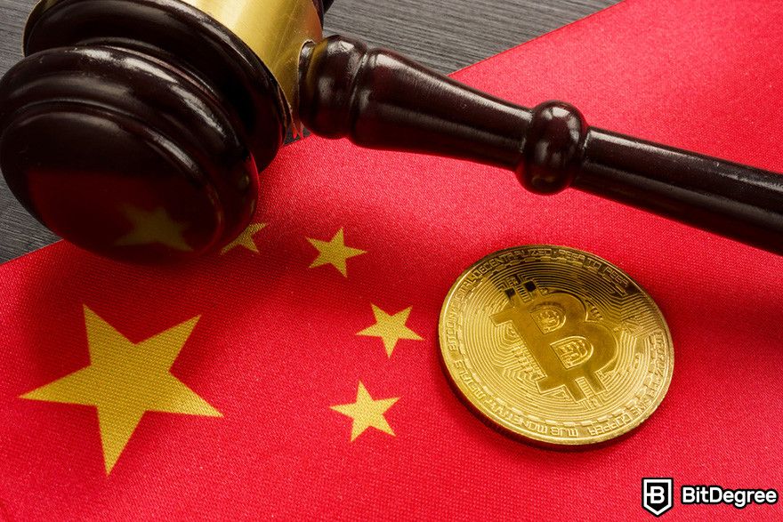 Why is crypto down: a Bitcoin coin and a gavel on a Chinese flag.