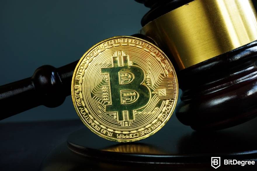 Will crypto recover: Gavel and Bitcoin coin for law and regulation of cryptocurrencies