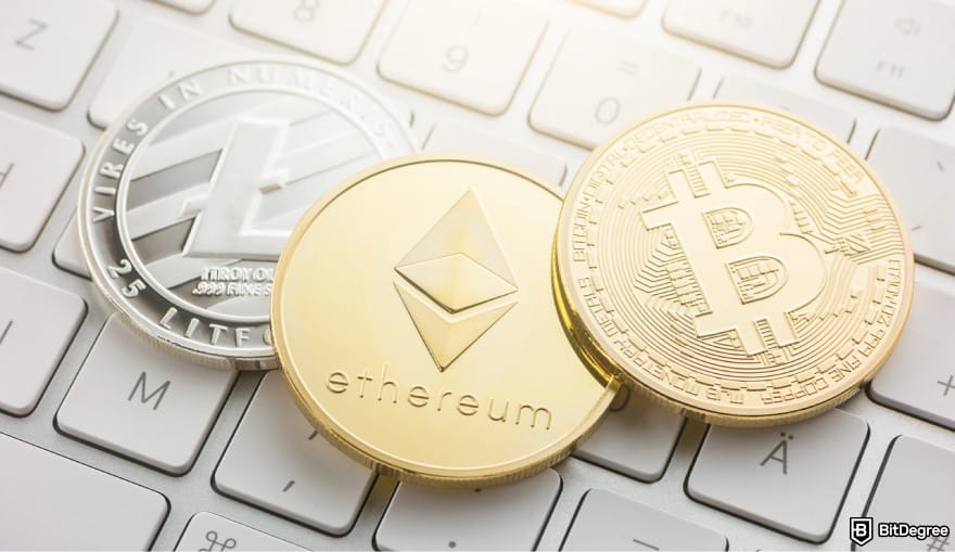 Will Shiba Inu coin reach $1: ETH, BTC, and LTC coins on top of a keyboard.