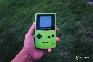 Holding a GameBoy