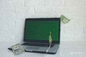 laptop with money