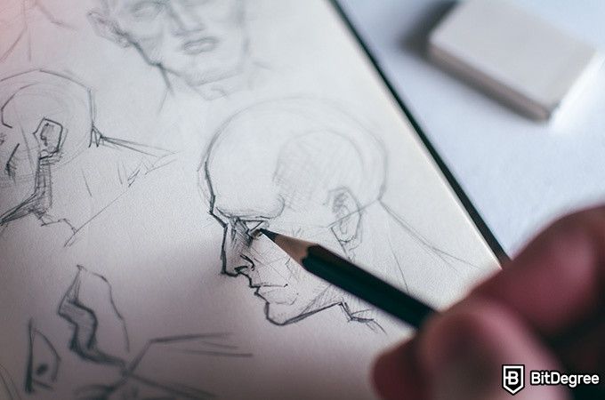 How to draw: a sketch of a head in a notebook.