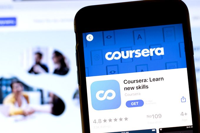 Coursera Python: Coursera's app on the phone screen.