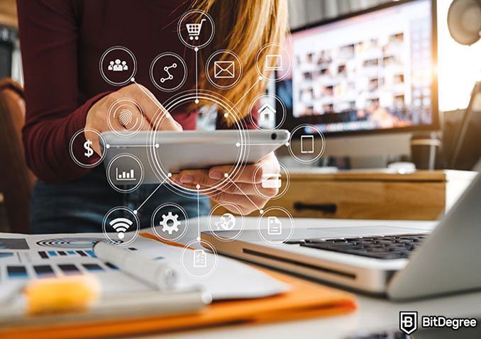 Digital marketing courses: a woman holding an ipad.