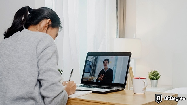 Distance learning: A girl is studying in a digital class.