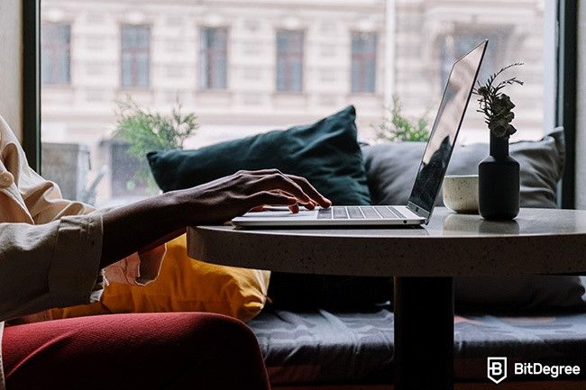 Distance Learning: a person's hands are typing on a keyboard.