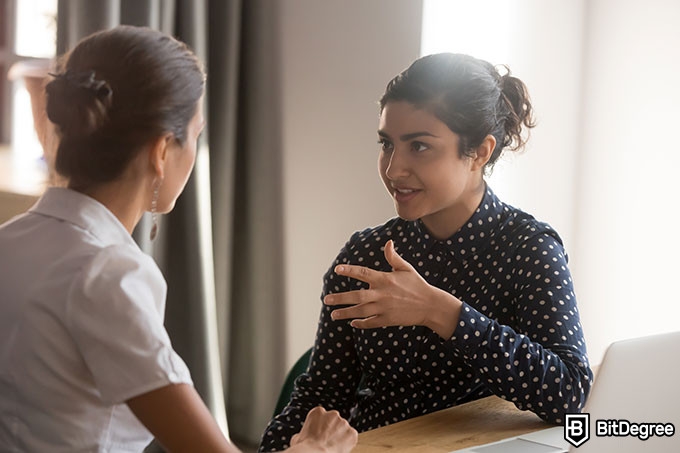 Harvard negotiation course: women speaking.