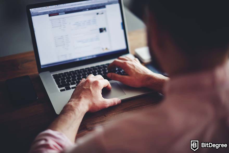 How to become a marketing manager: a man working on computer.